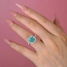 Load image into Gallery viewer, Exquisite Halo Cushion Cut Cyan Blue Engagement Ring In Sterling Silver
